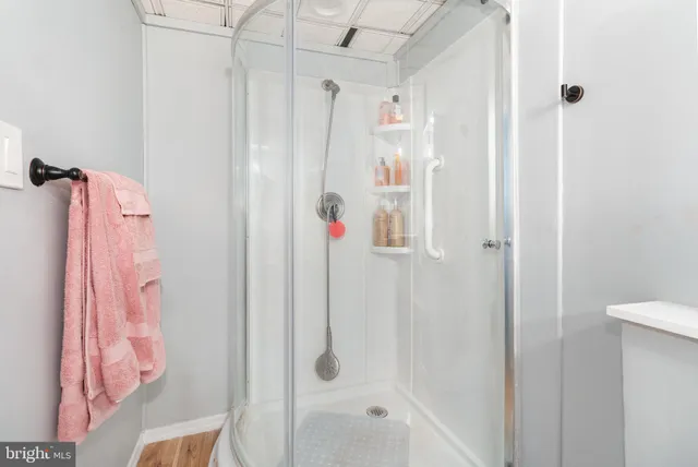 a view of city from deck with patio