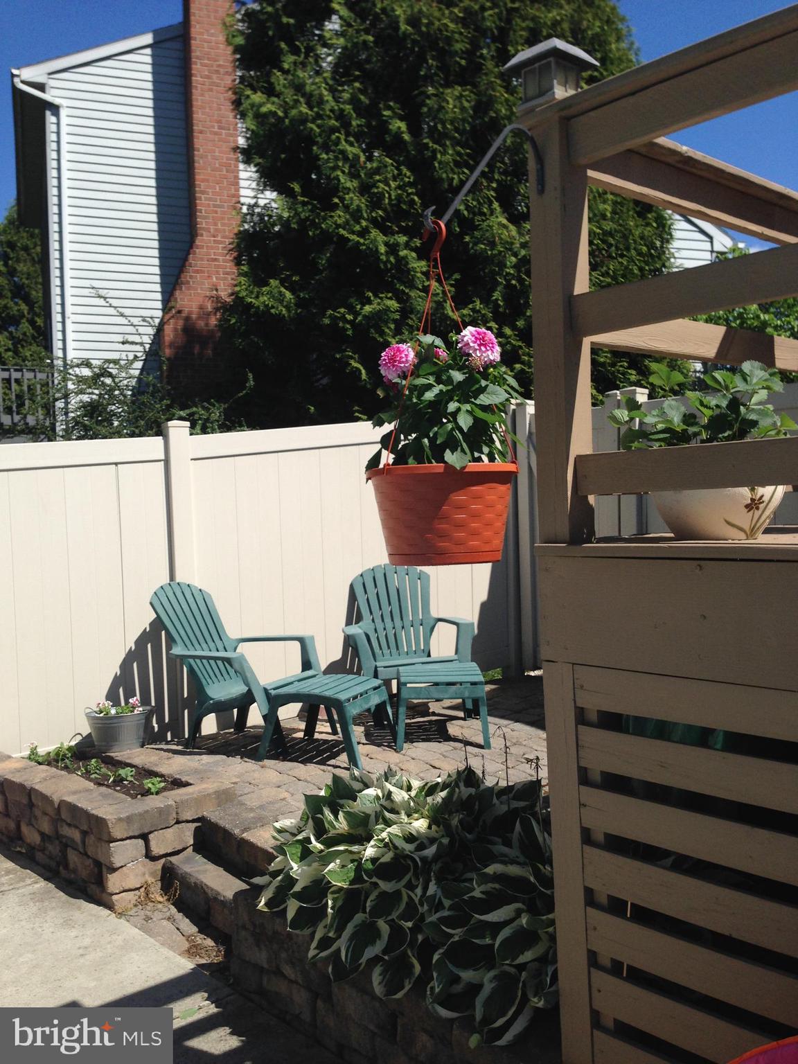 6418 Taunton Road Harrisburg, PA 17111 - Photo 29 of 39 a view of a house with a flower garden