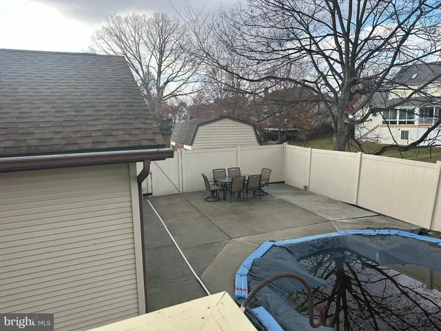 a view of a back yard of the house