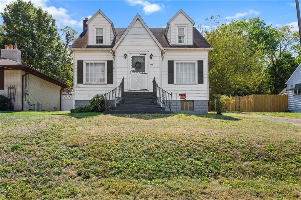 535 Oak Street Sharpsville, PA 16150 - Photo 1 of 19 a front view of a house with a yard