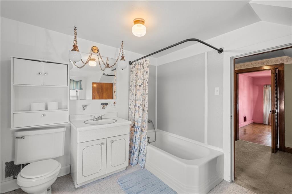 535 Oak Street Sharpsville, PA 16150 - Photo 14 of 19 a bathroom with a sink a toilet and shower