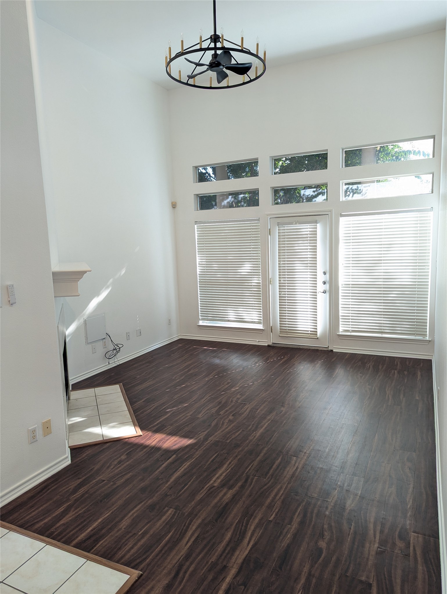 2918 Ranch Road 620 North, Unit Y194 Austin, TX 78734 - Photo 6 of 35 a view of a room with wooden floor window and a kitchen space