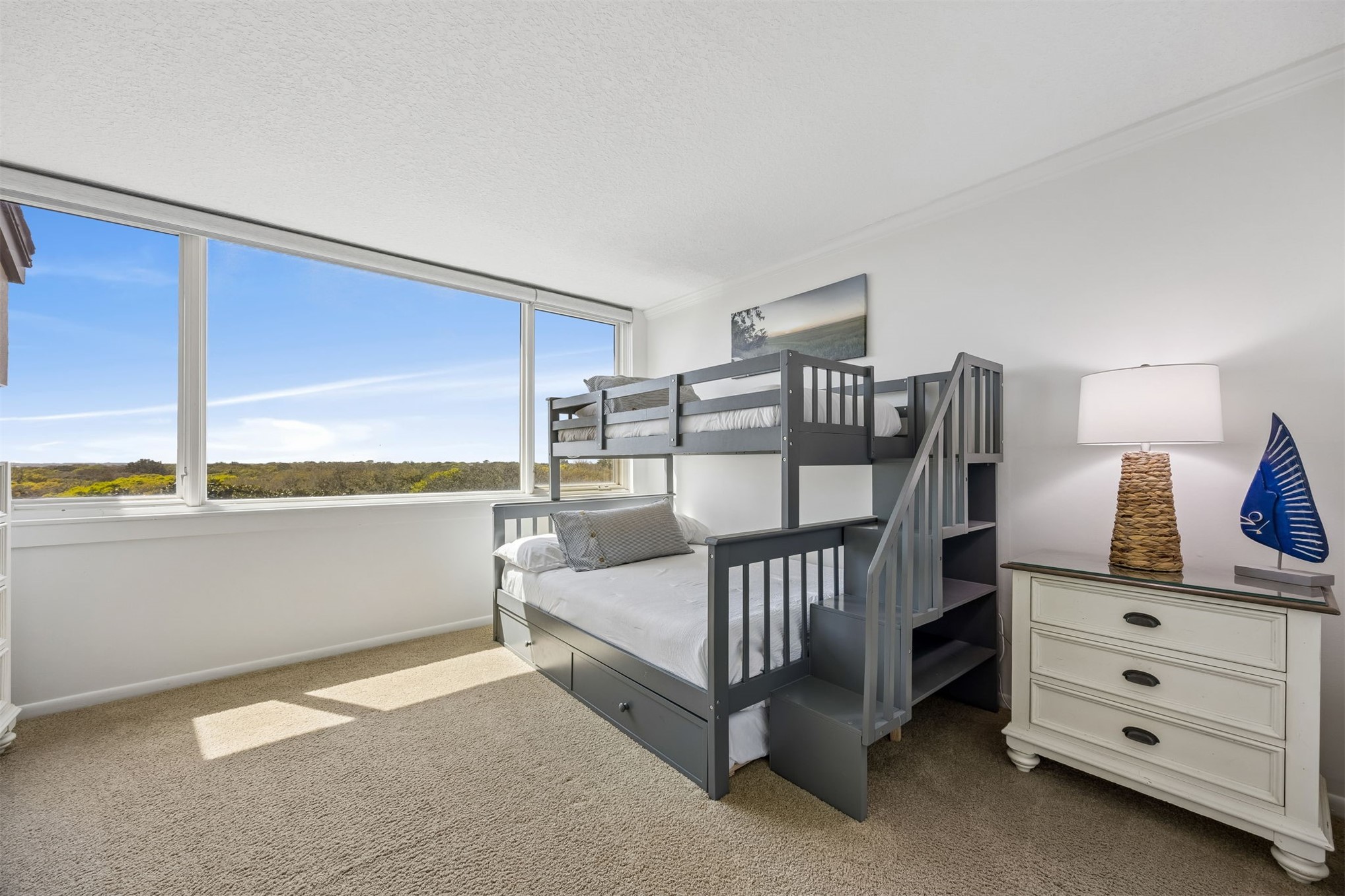 1119 Beach Walker Road, Unit 1119 Fernandina Beach, FL 32034 - Photo 3 of 32 a bedroom with furniture and a window