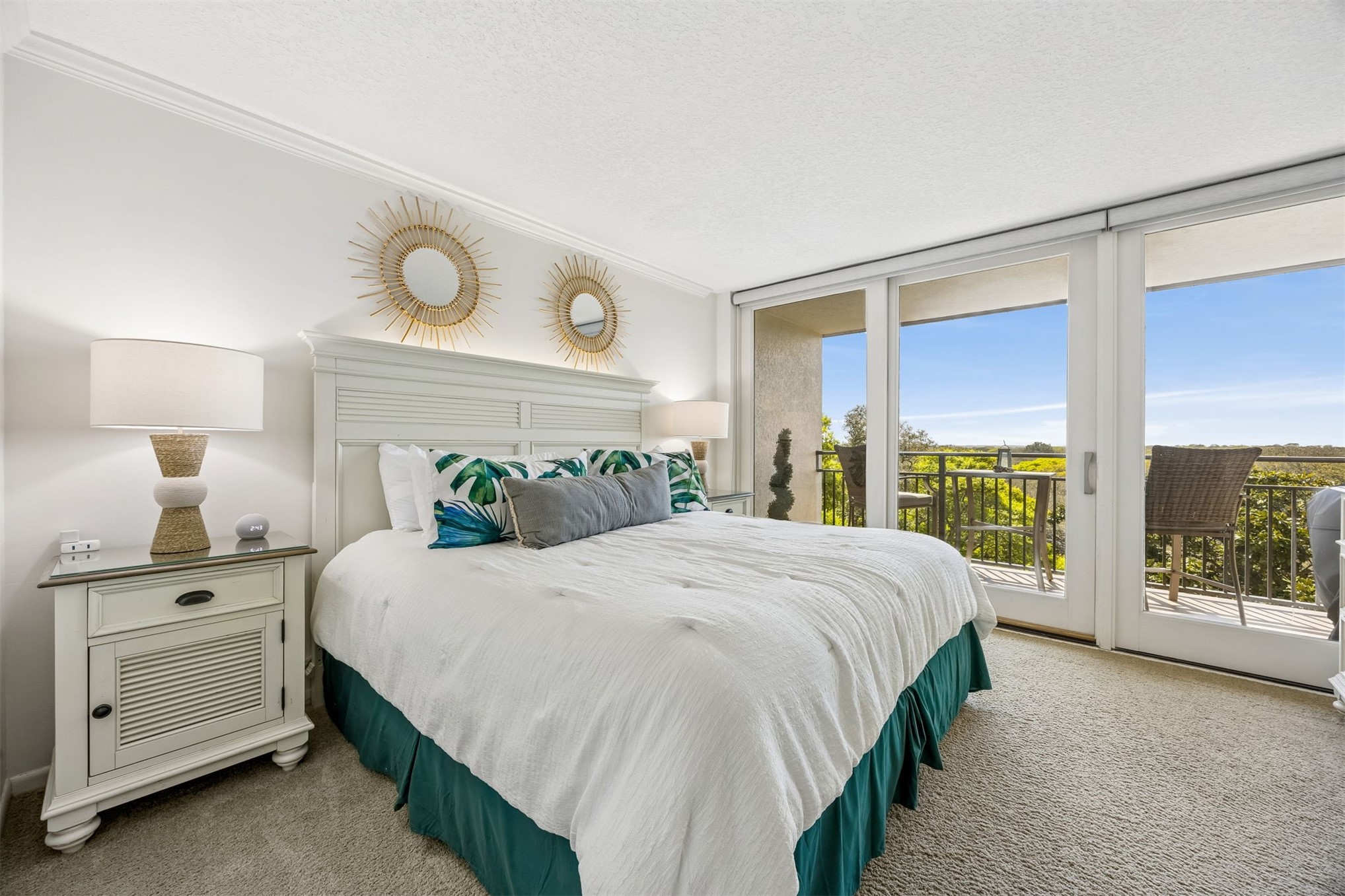 1119 Beach Walker Road, Unit 1119 Fernandina Beach, FL 32034 - Photo 5 of 32 a bedroom with a bed and a large window