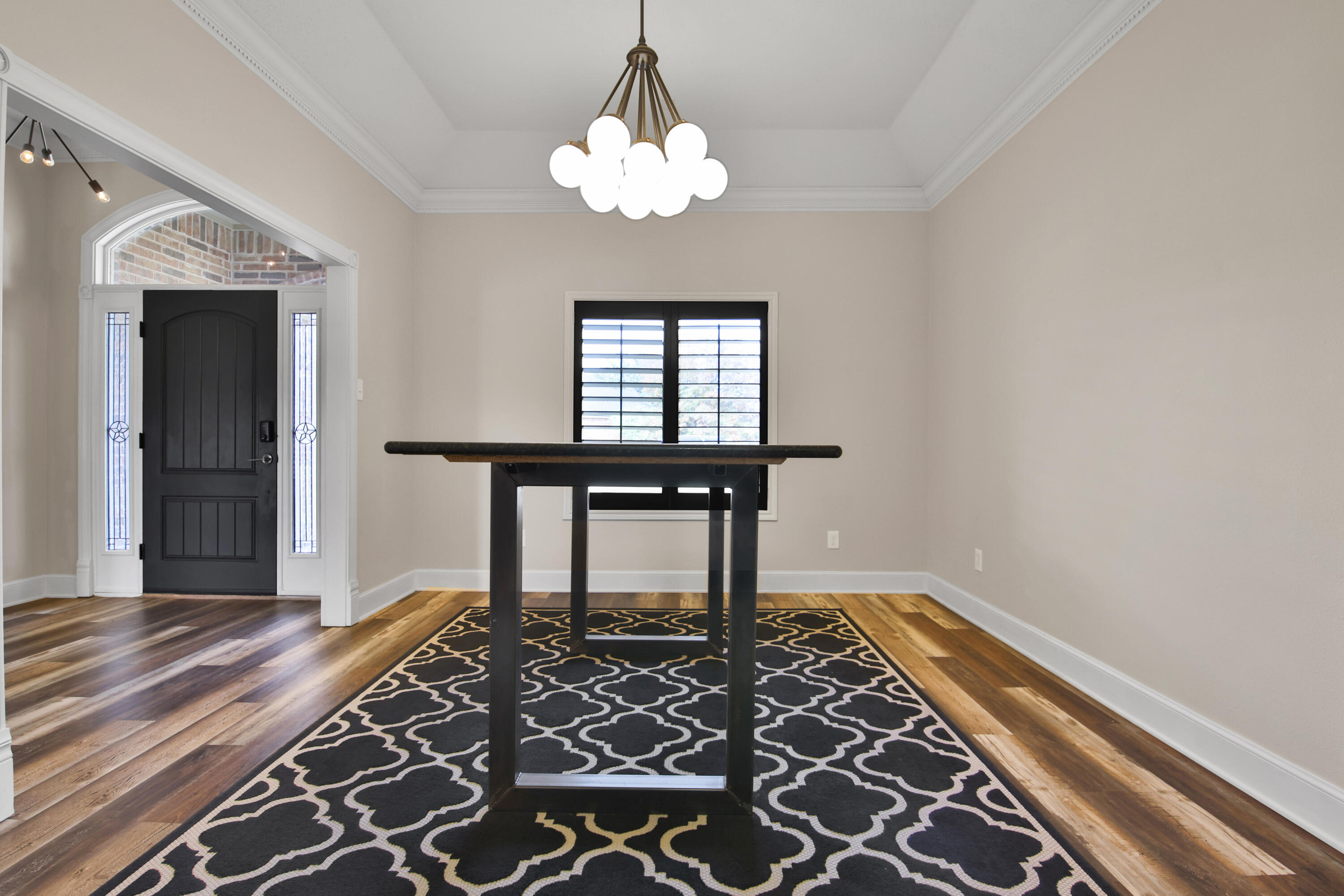 4701 109th Place Lubbock, TX 79424 - Photo 11 of 42 a bedroom with a bed and a table