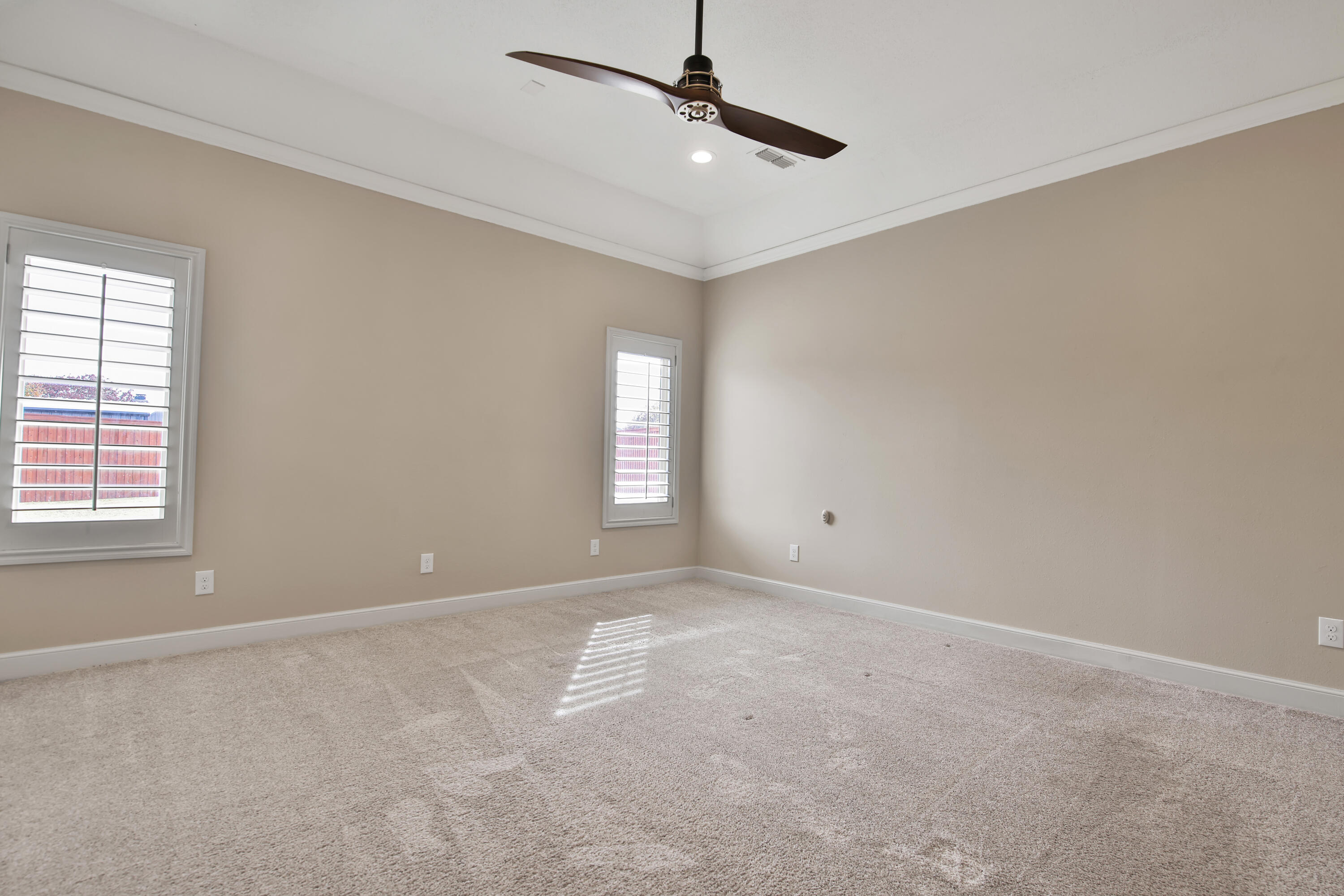 4701 109th Place Lubbock, TX 79424 - Photo 14 of 42 a view of an empty room with a window