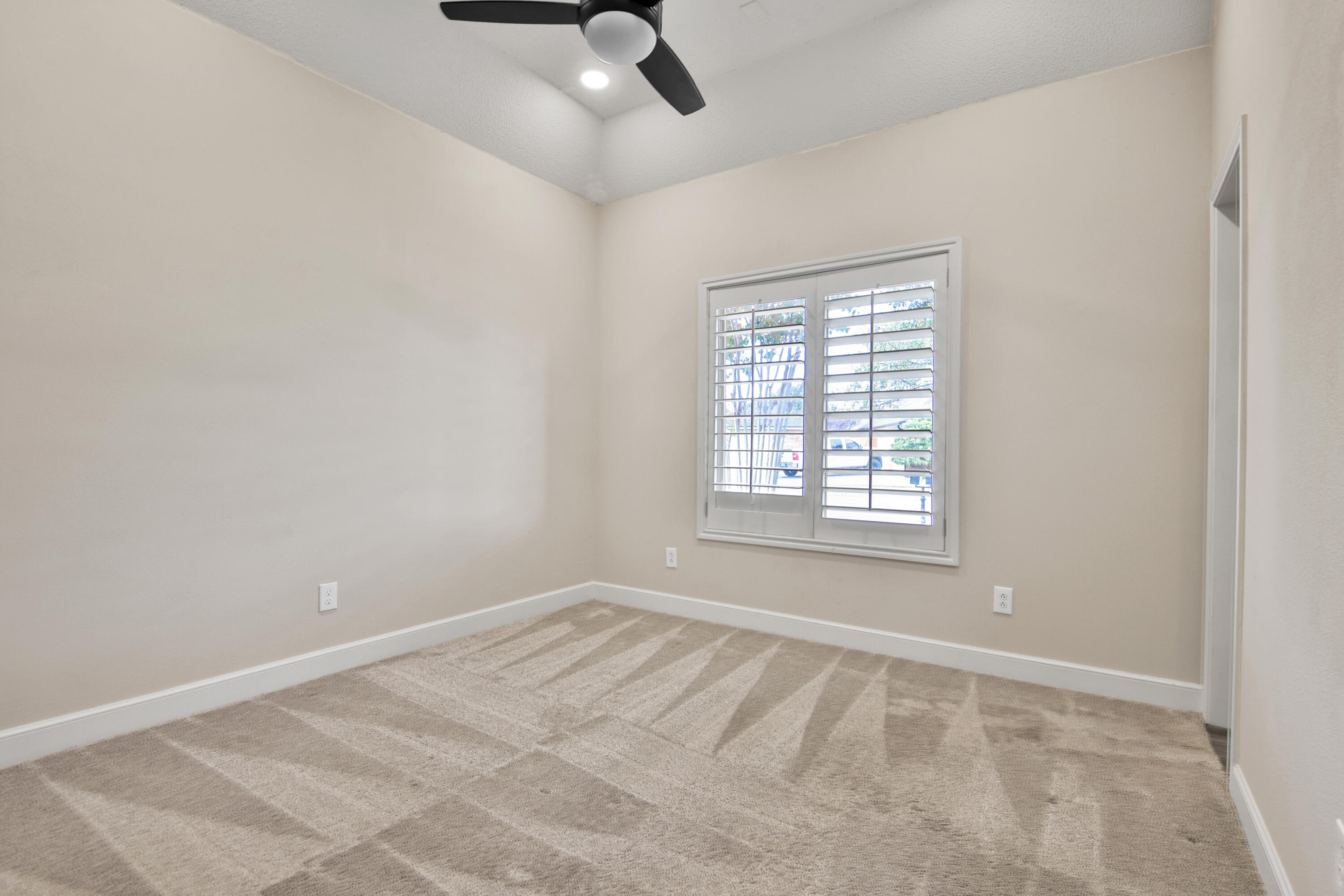 4701 109th Place Lubbock, TX 79424 - Photo 25 of 42 a view of an empty room with a window