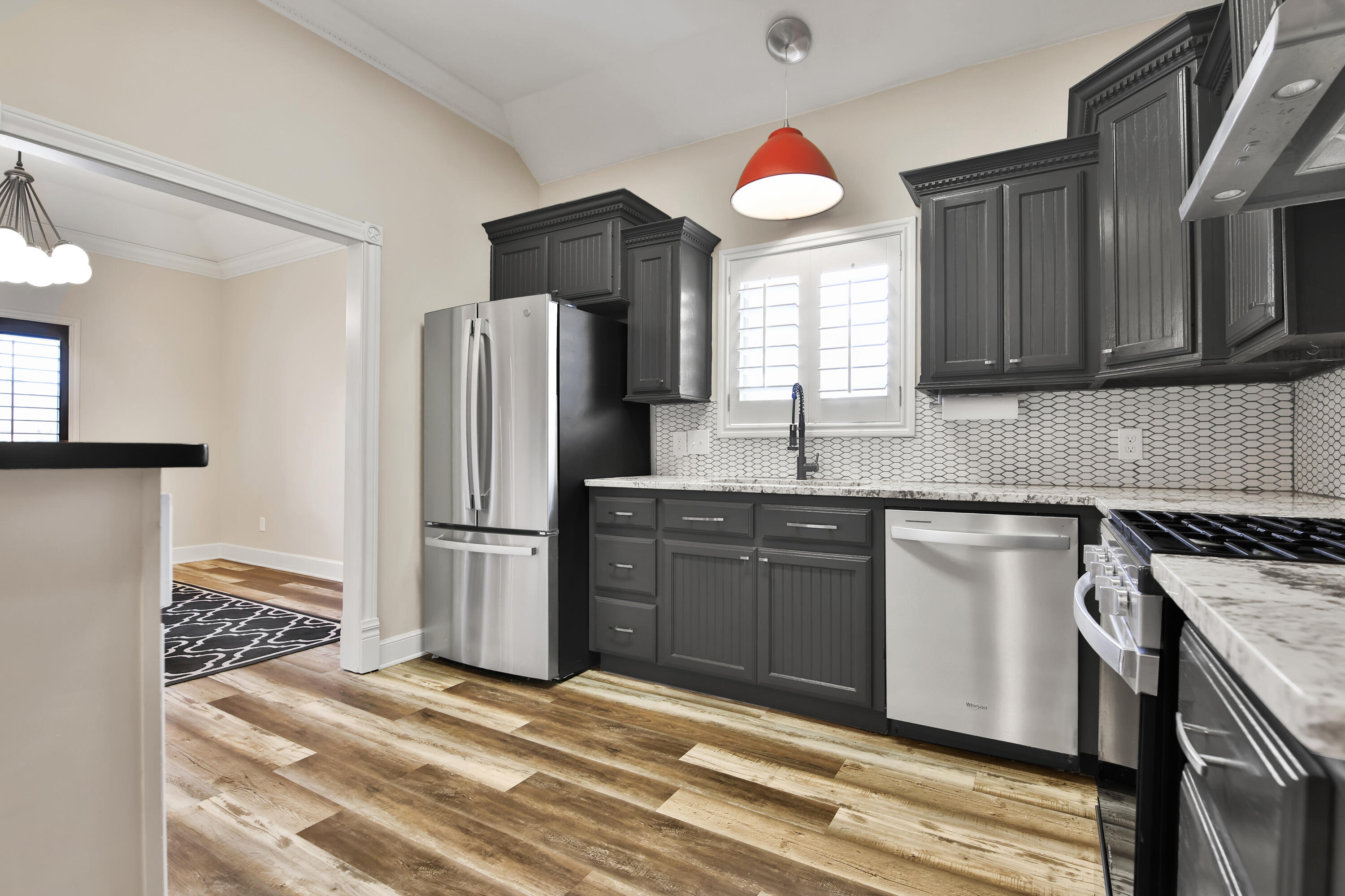 4701 109th Place Lubbock, TX 79424 - Photo 9 of 42 a kitchen with a refrigerator stove and sink