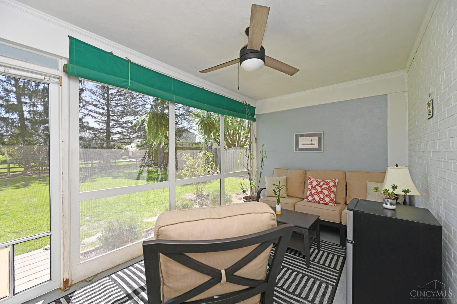 8851 Roundhill Road Cincinnati, OH 45236 - Photo 26 of 34 Screened-in patio off the kitchen and garage.