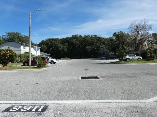 a view of street with tall buildings