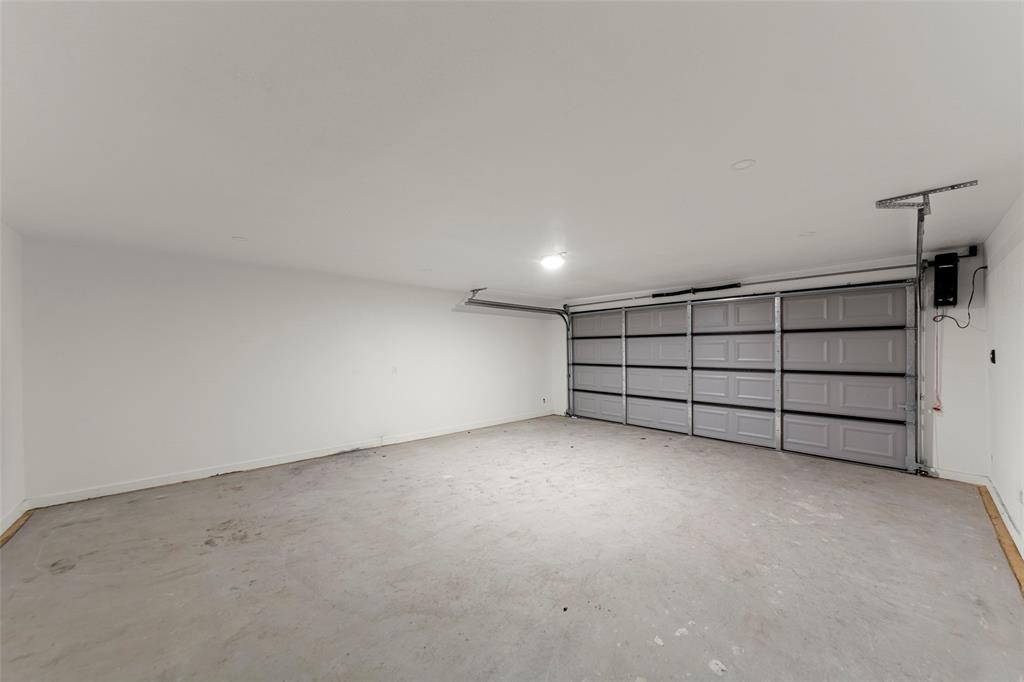 2945 Healey Drive Dallas, TX 75228 - Photo 25 of 38 a view of an empty garage