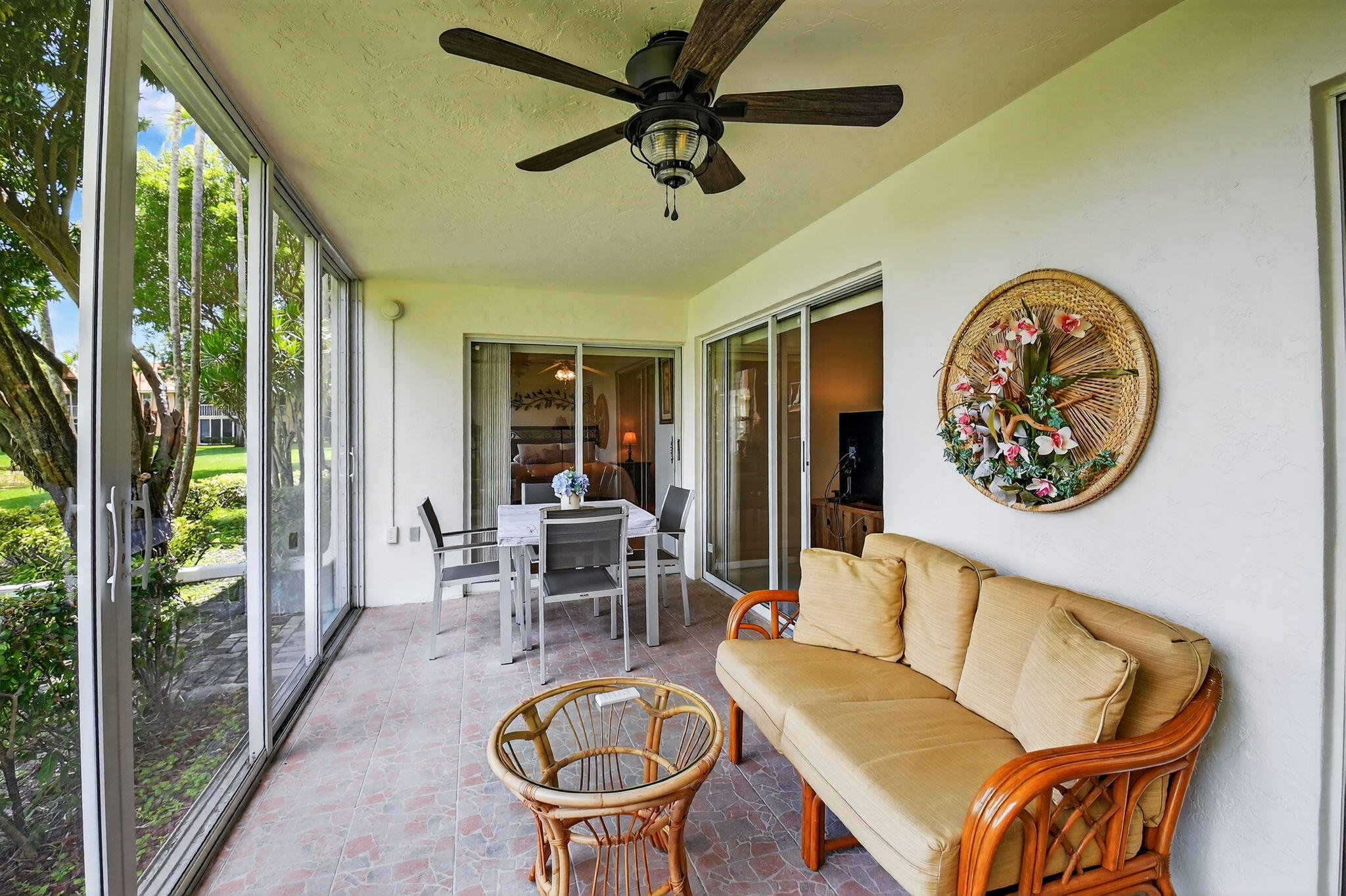 9877 Seacrest Circle, Unit 101 Boynton Beach, FL 33437 - Photo 16 of 39 Glass Enclosed Patio