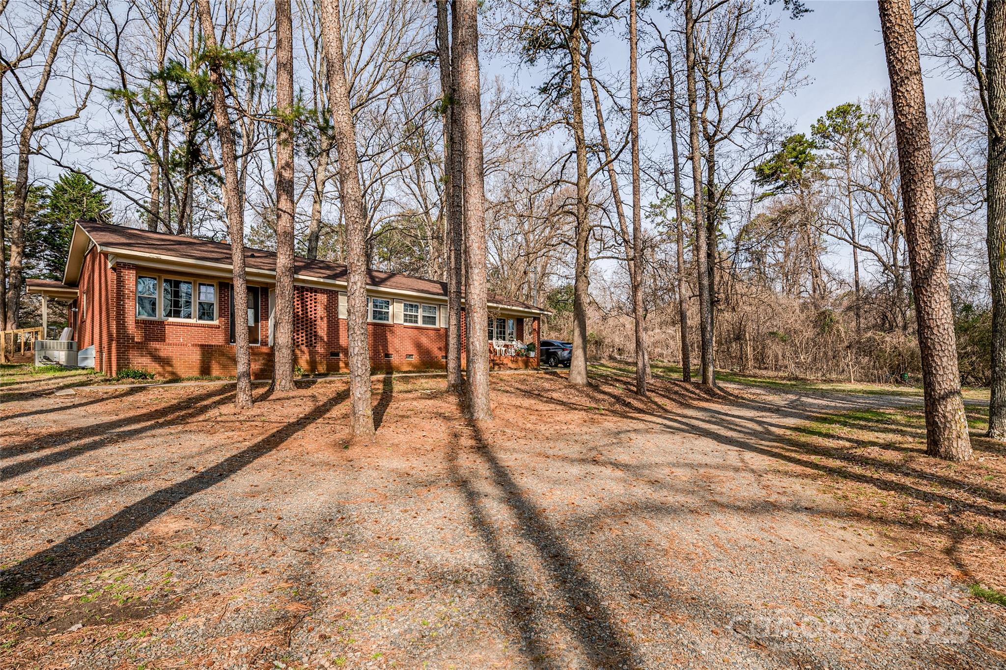13216 Lawyers Road Mint Hill, NC 28227 - Photo 14 of 17 a view of a yard with trees