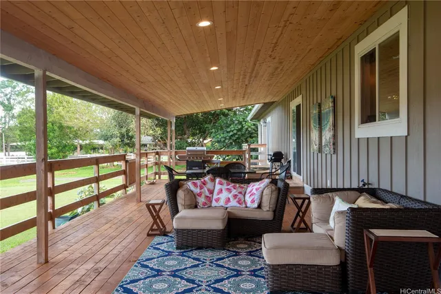 a outdoor space with patio the couches and a dining table with garden view