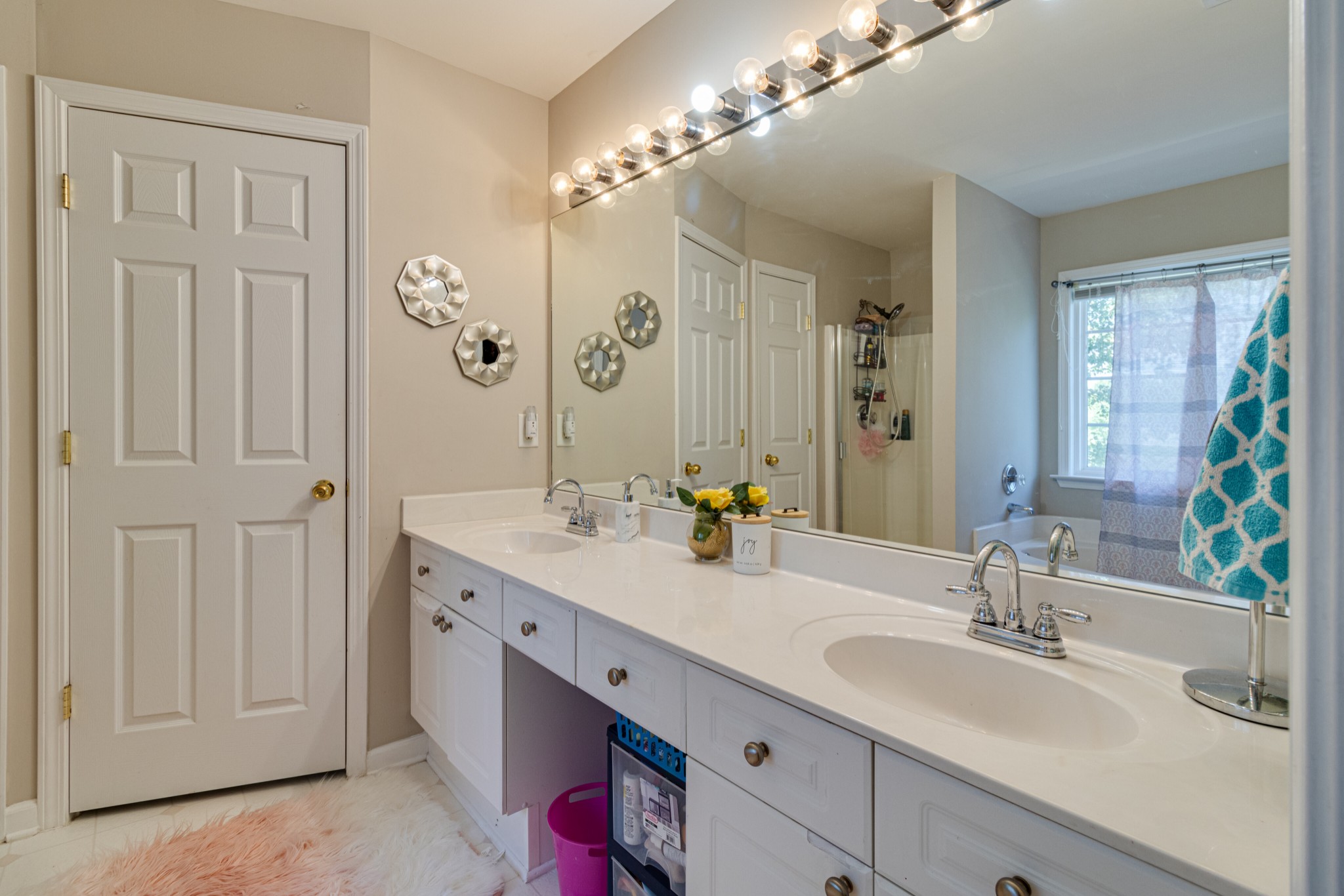 1696 Eagle Trace Drive Mount Juliet, TN 37122 - Photo 15 of 28 a bathroom with a double vanity sink and a mirror