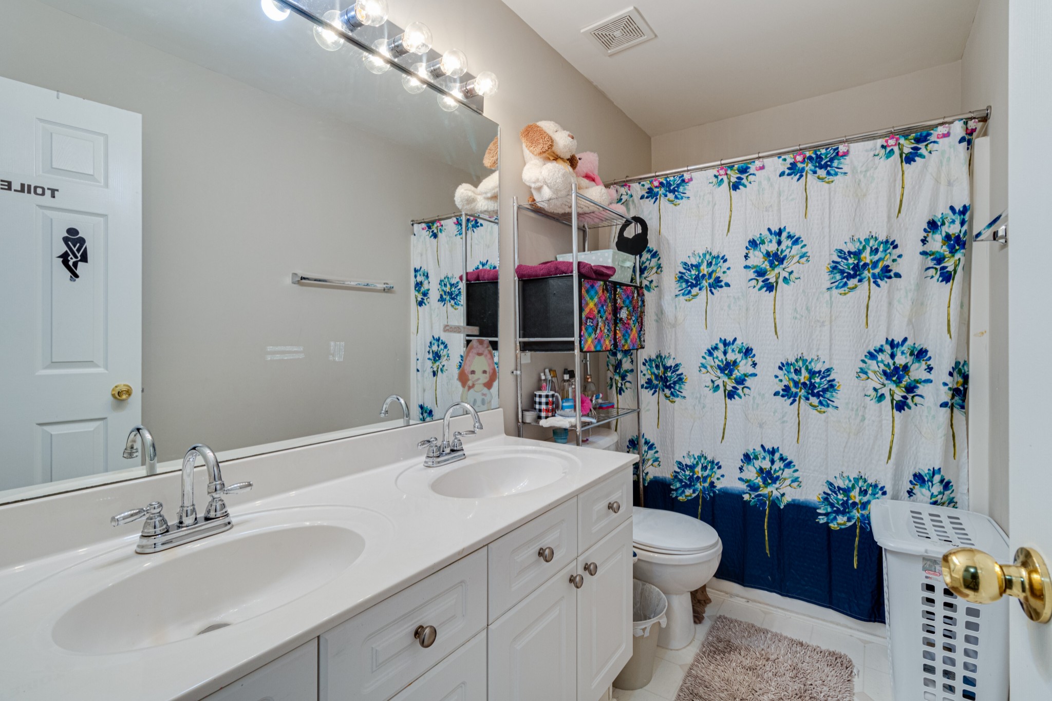 1696 Eagle Trace Drive Mount Juliet, TN 37122 - Photo 19 of 28 a bathroom with a sink mirror and vanity