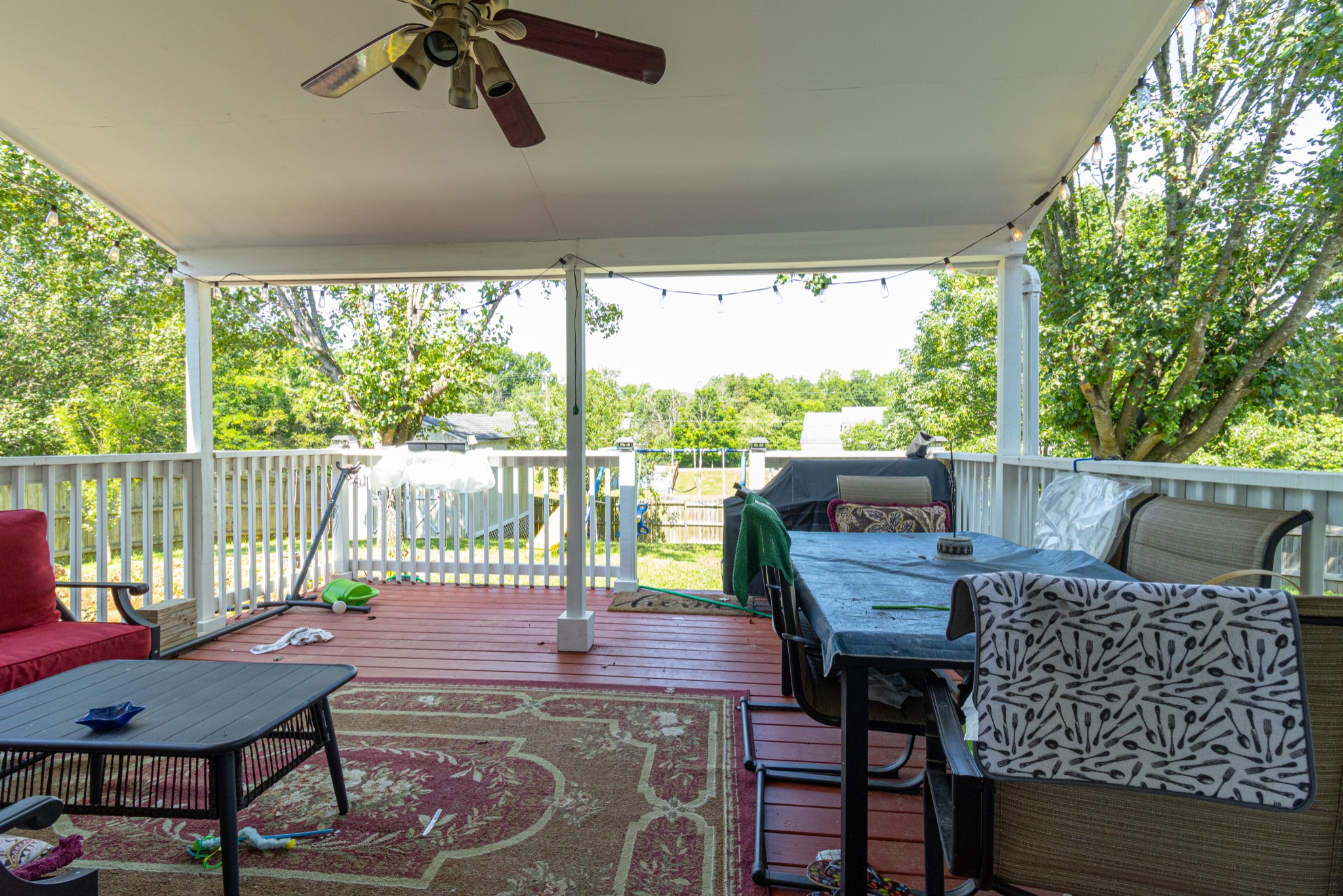 1696 Eagle Trace Drive Mount Juliet, TN 37122 - Photo 21 of 28 a view of a patio with a table chairs and a backyard