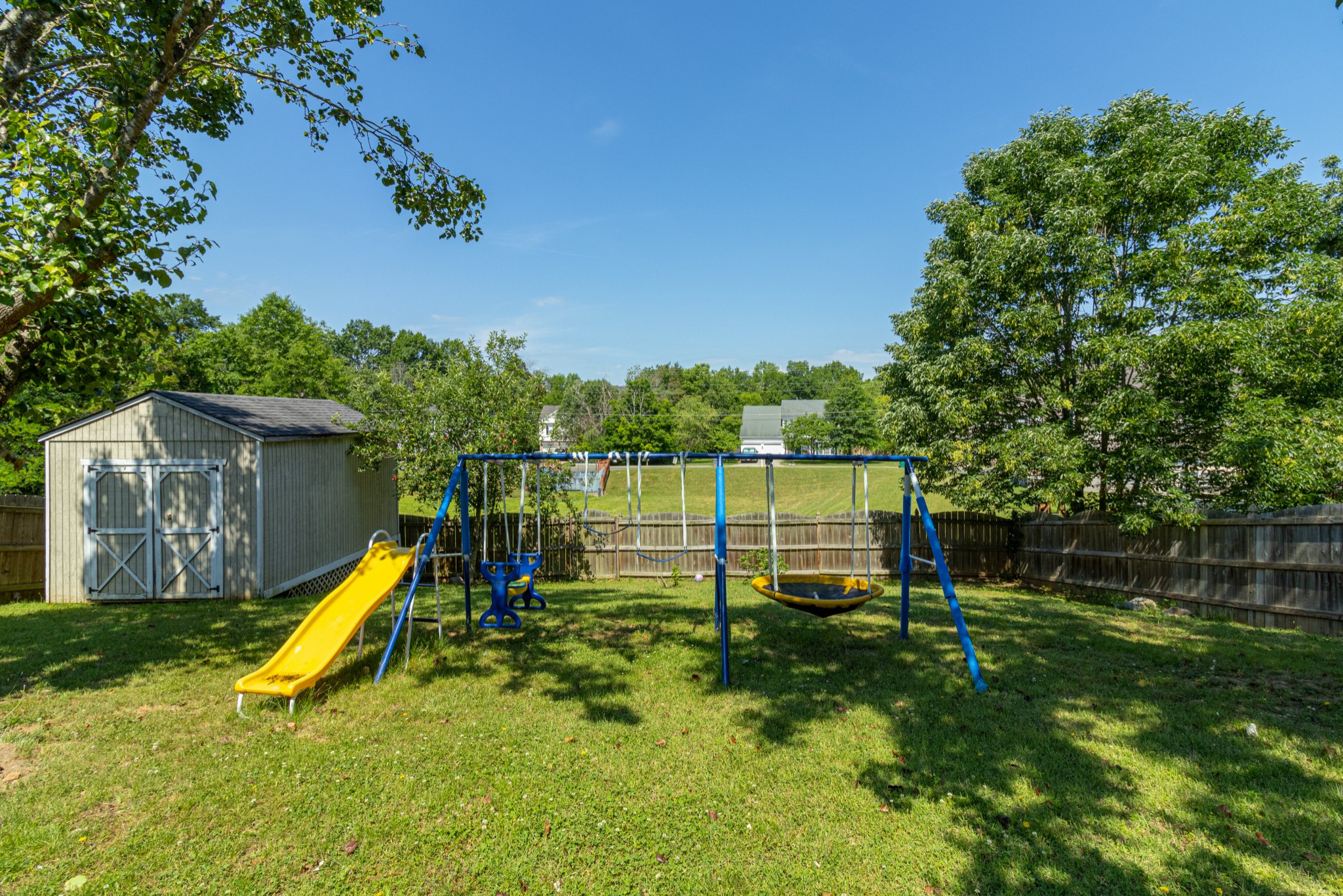 1696 Eagle Trace Drive Mount Juliet, TN 37122 - Photo 26 of 28 a garden with swimming pool and deck