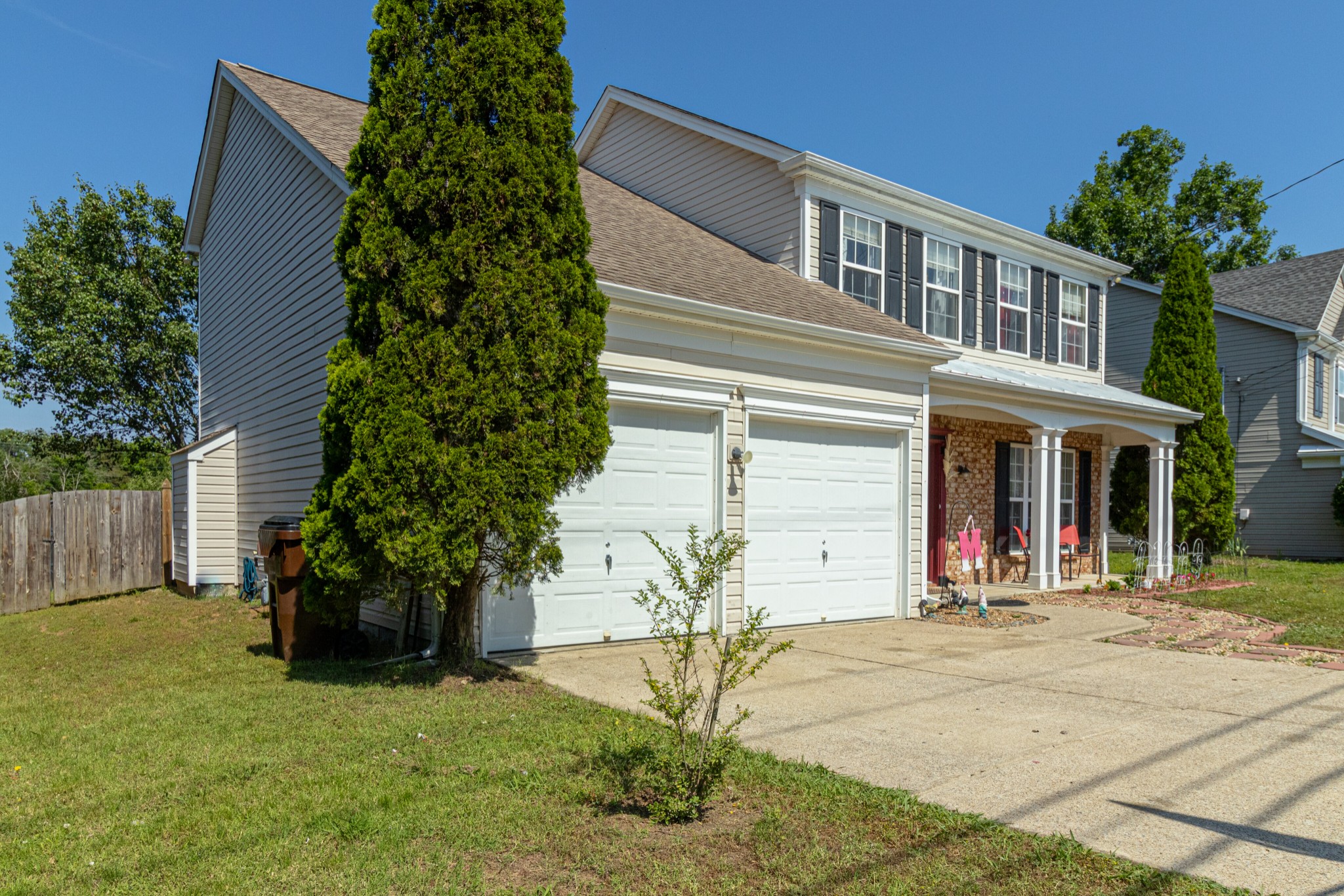 1696 Eagle Trace Drive Mount Juliet, TN 37122 - Photo 27 of 28 a view of a house with potted plants and a yard