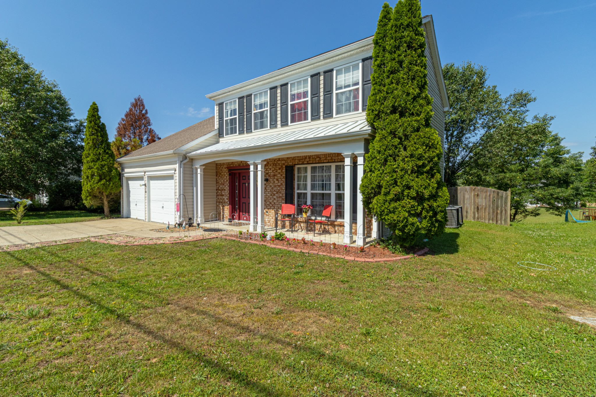 1696 Eagle Trace Drive Mount Juliet, TN 37122 - Photo 28 of 28 a view of a house with a swimming pool