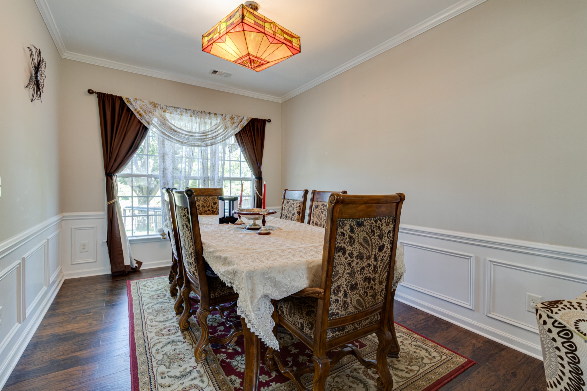 1696 Eagle Trace Drive Mount Juliet, TN 37122 - Photo 6 of 28 a view of a dining room with furniture and wooden floor