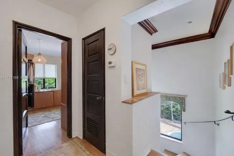 a view of front door and bedroom