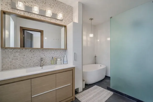 a bathroom with a sink and a bathtub