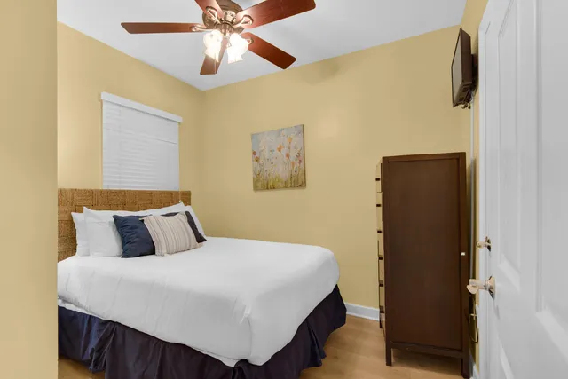 a bedroom with a bed and a walk in closet