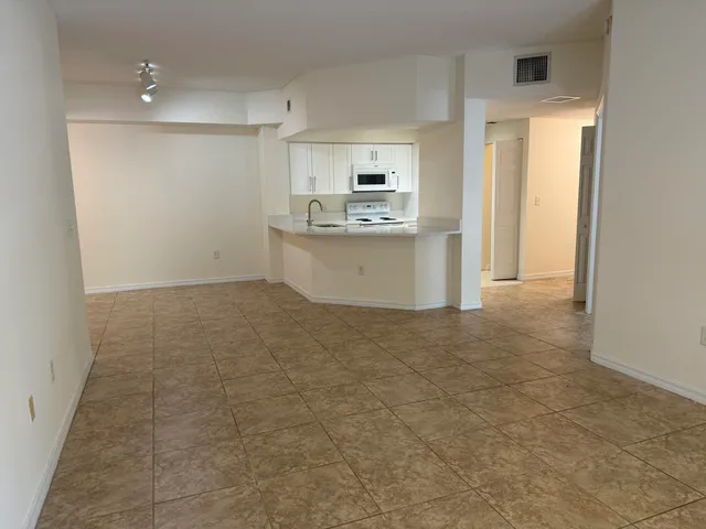 a view of hallway with a window