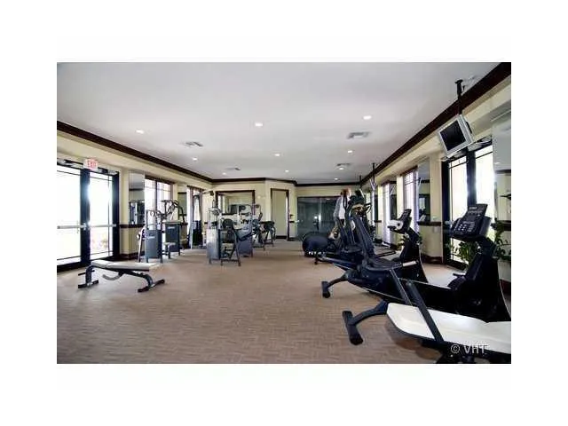 a swimming pool with outdoor seating and yard