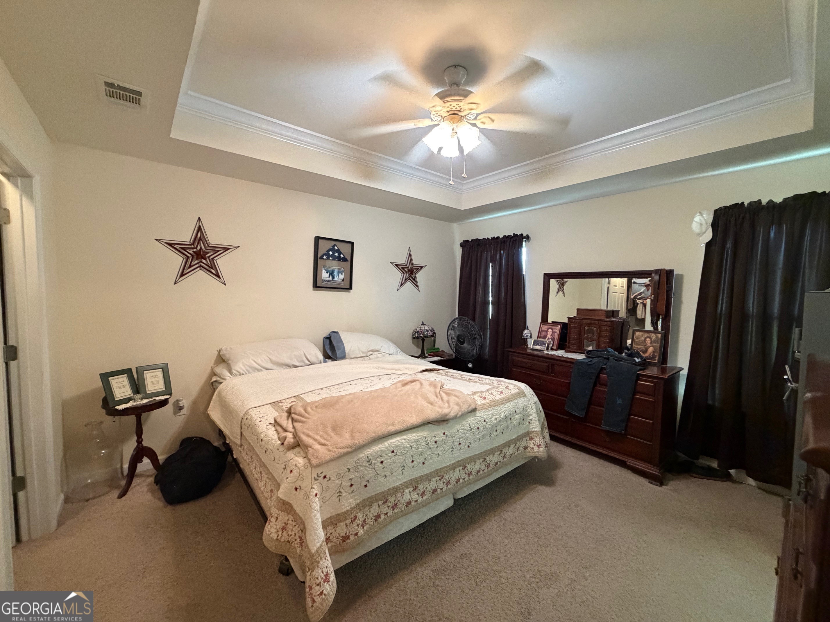 257 Mountain Laurel Road Nashville, GA 31639 - Photo 21 of 41 a bed room with a bed and a ceiling fan