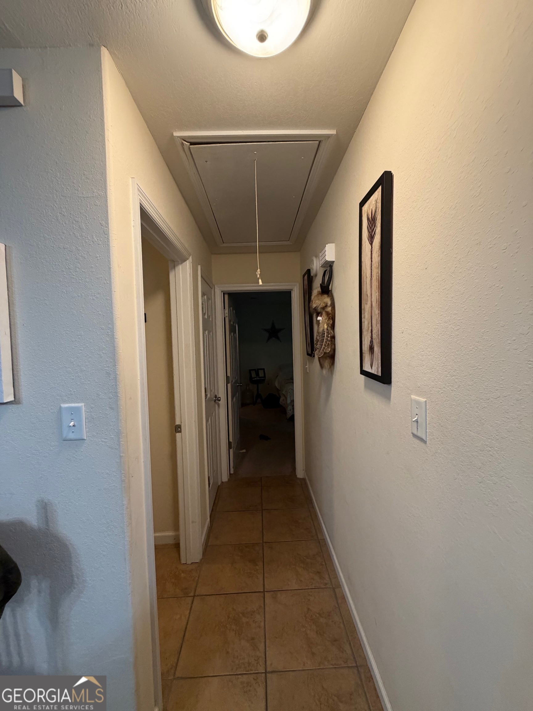 257 Mountain Laurel Road Nashville, GA 31639 - Photo 23 of 41 a view of a hallway with wooden shelves