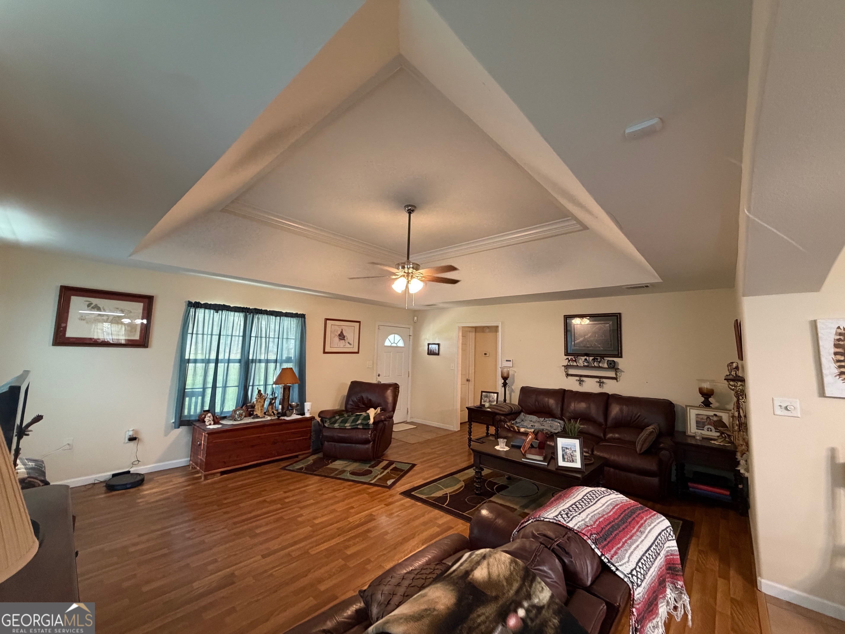 257 Mountain Laurel Road Nashville, GA 31639 - Photo 26 of 41 a living room with furniture ceiling fan and a window