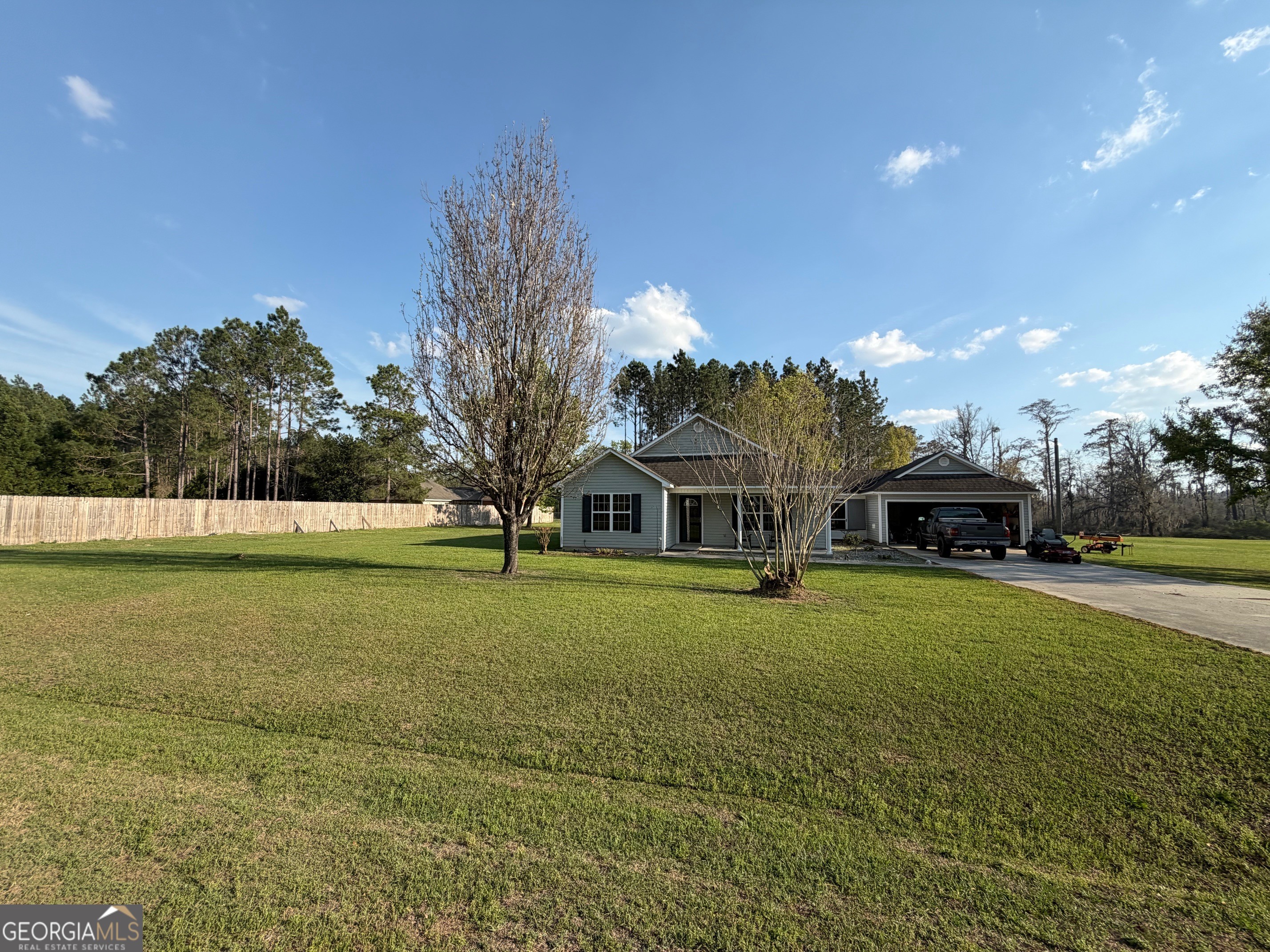 257 Mountain Laurel Road Nashville, GA 31639 - Photo 41 of 41 a front view of a house with a yard
