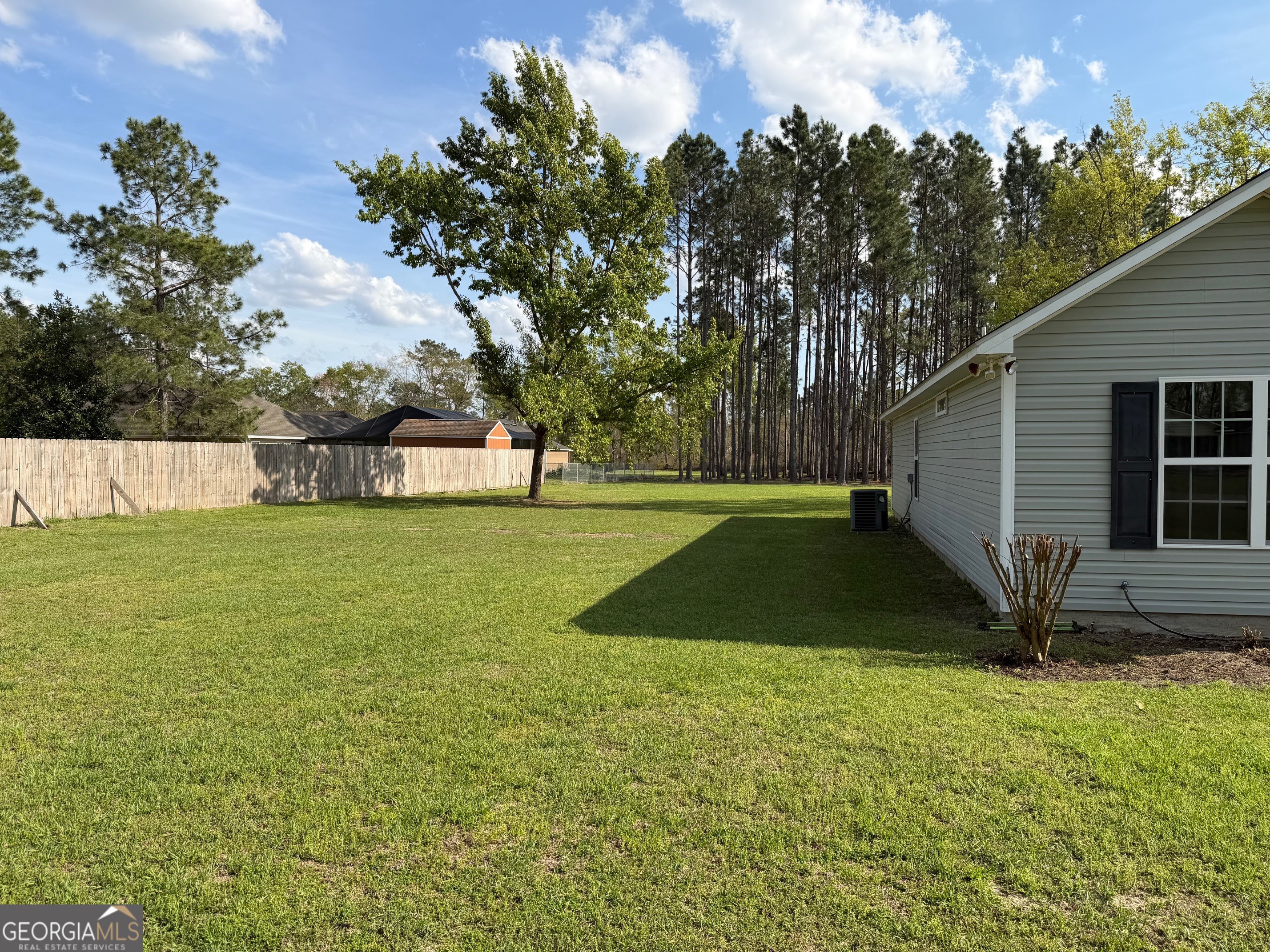 257 Mountain Laurel Road Nashville, GA 31639 - Photo 8 of 41 a view of a house with a yard