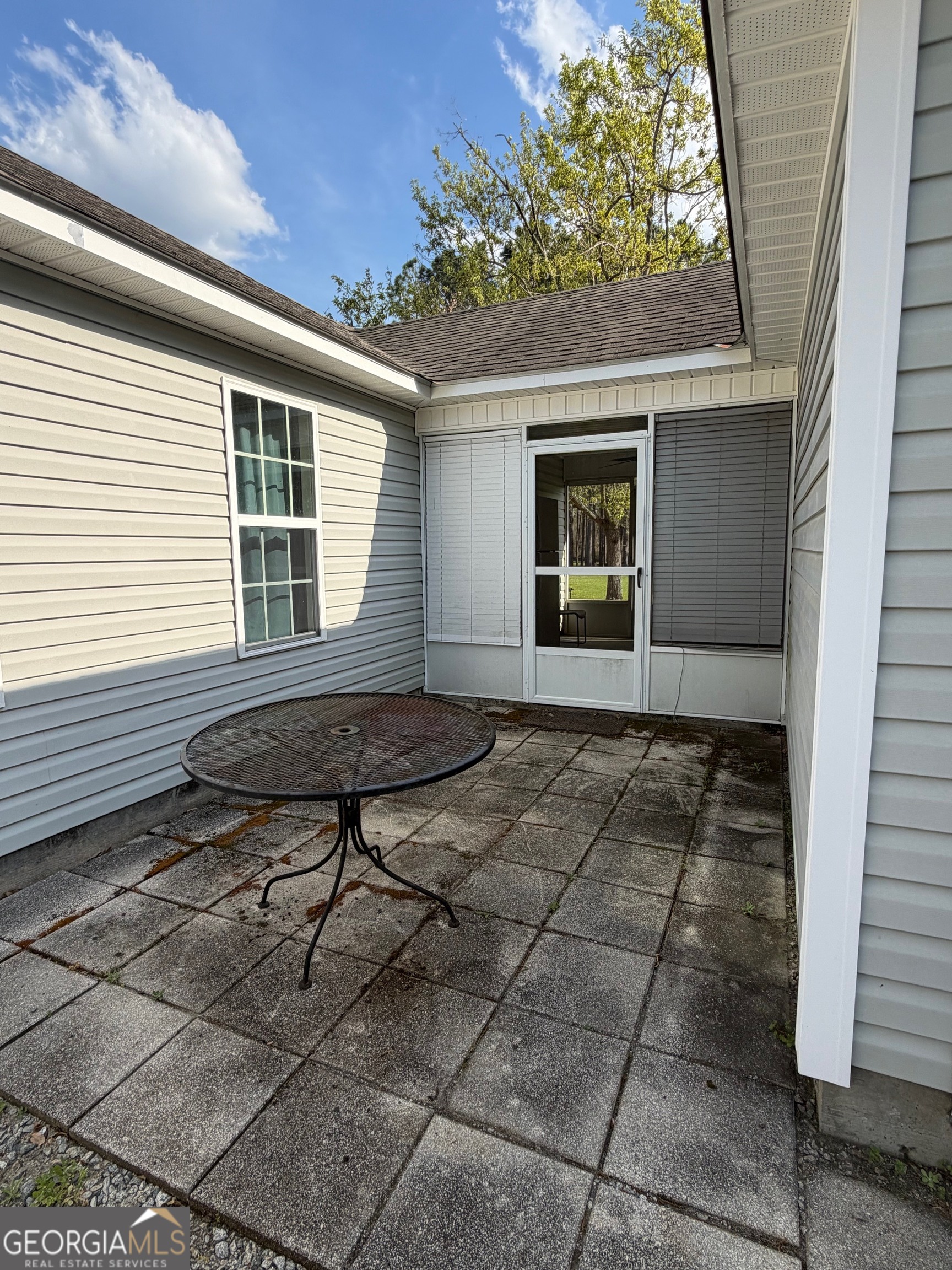 257 Mountain Laurel Road Nashville, GA 31639 - Photo 10 of 41 a view of house with backyard and sitting area