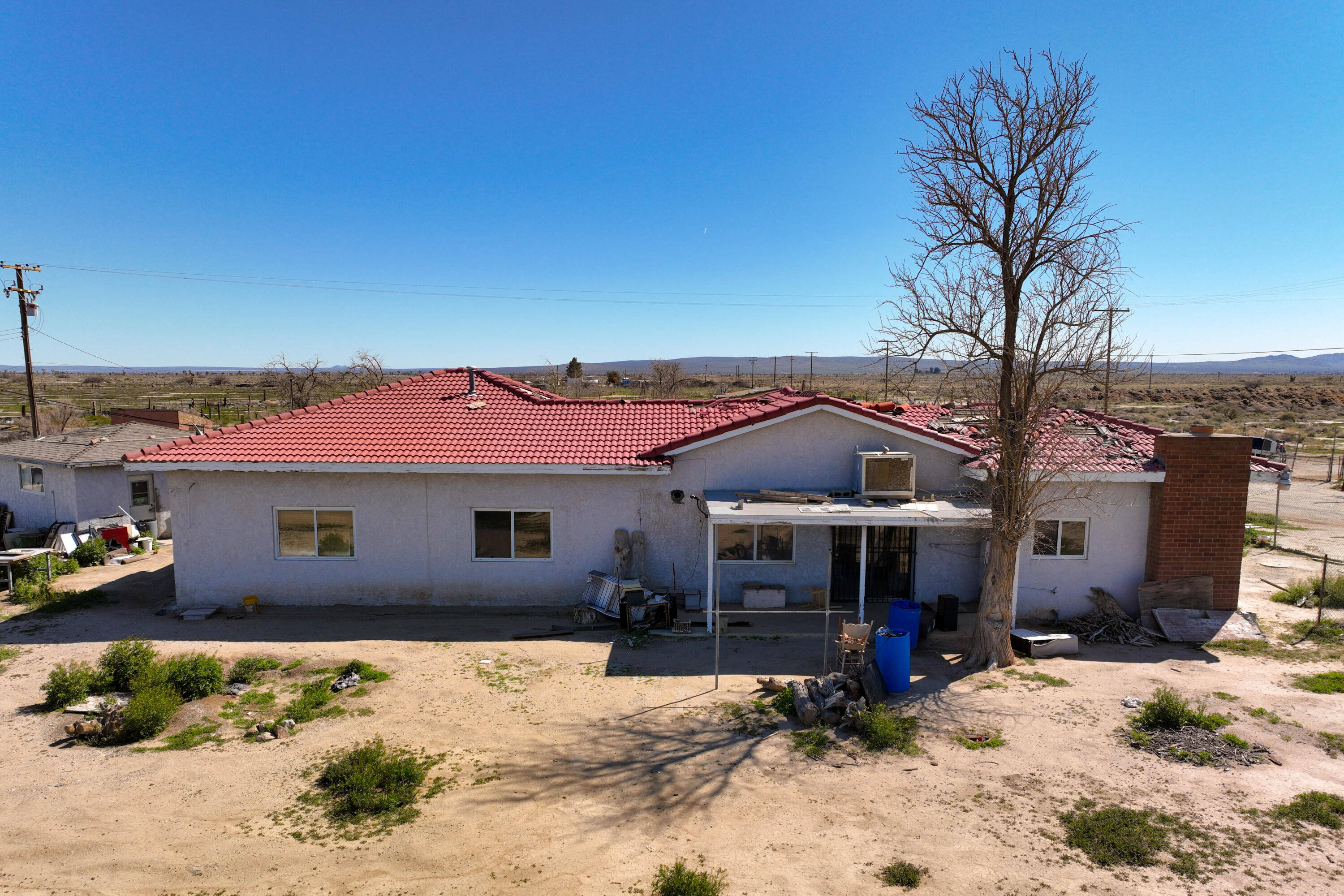 48801 97th Street East Lancaster, CA 93535 - Photo 1 of 14 a view of a house with a yard