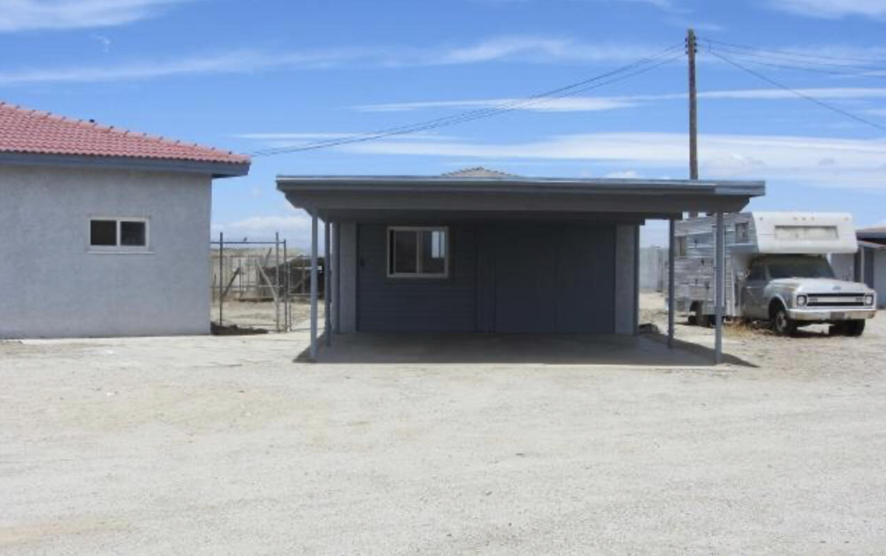 48801 97th Street East Lancaster, CA 93535 - Photo 7 of 14 a view of a car garage
