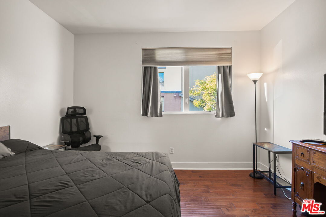 25 Delancy Irvine, CA 92612 - Photo 26 of 41 a bedroom with a bed and a window