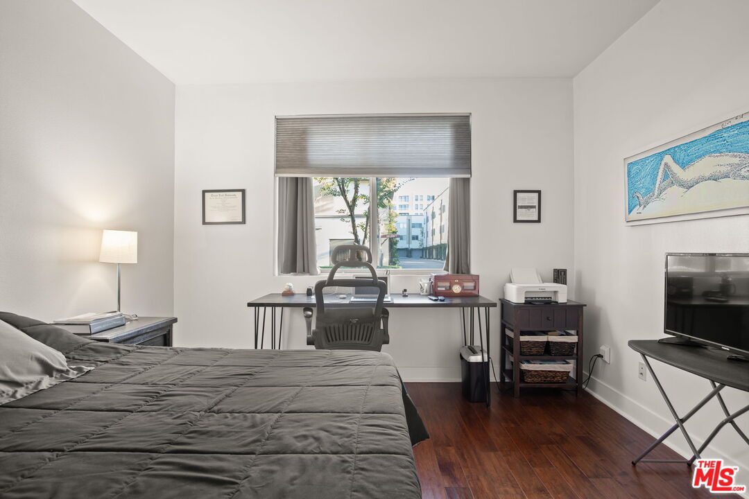 25 Delancy Irvine, CA 92612 - Photo 31 of 41 a bed room with a bed window and a television