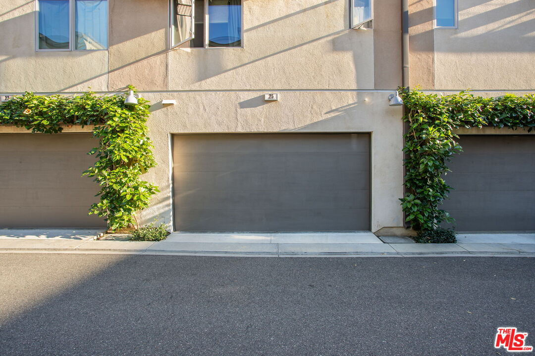 25 Delancy Irvine, CA 92612 - Photo 36 of 41 a front view of a house with garage