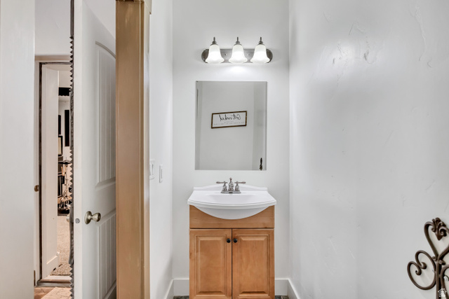 3054 West Ridgeline Road Stockton, UT 84071 - Photo 57 of 88 Half bath with vanity