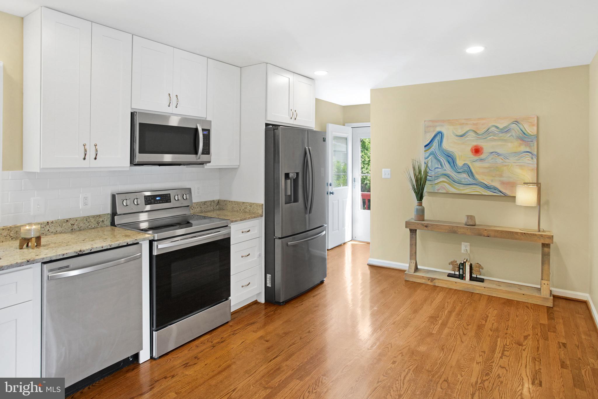 133 Oakview Drive Southeast Leesburg, VA 20175 - Photo 7 of 32 kitchen to back door