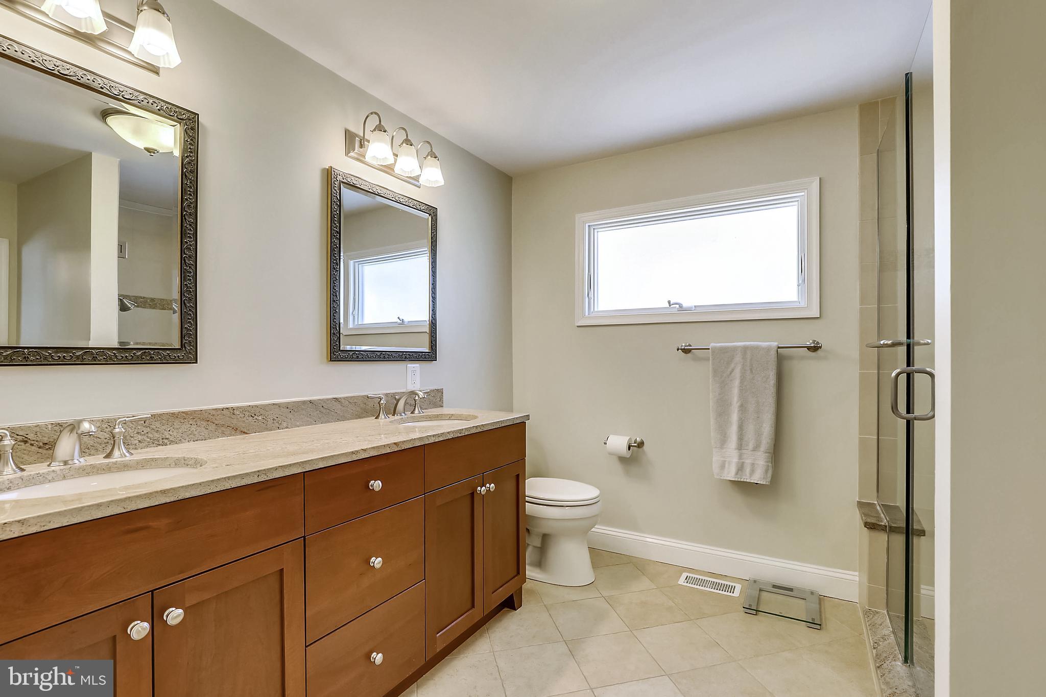 1602 Sherwood Road Silver Spring, MD 20902 - Photo 18 of 41 Updated primary bath with dual sinks
