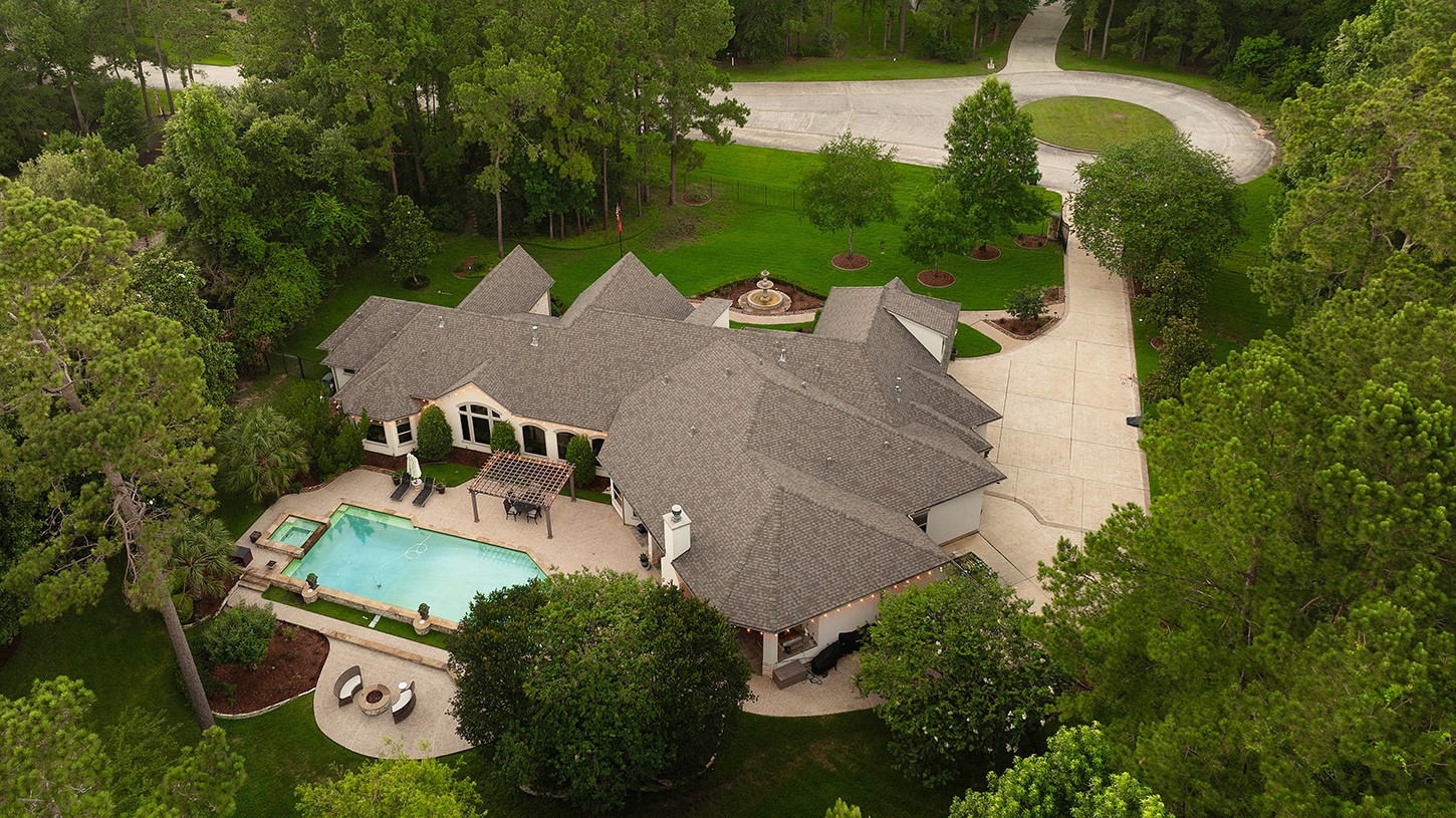 119 Angel Leaf Road The Woodlands, TX 77380 - Photo 49 of 50 an aerial view of a house with outdoor space pool seating area and yard