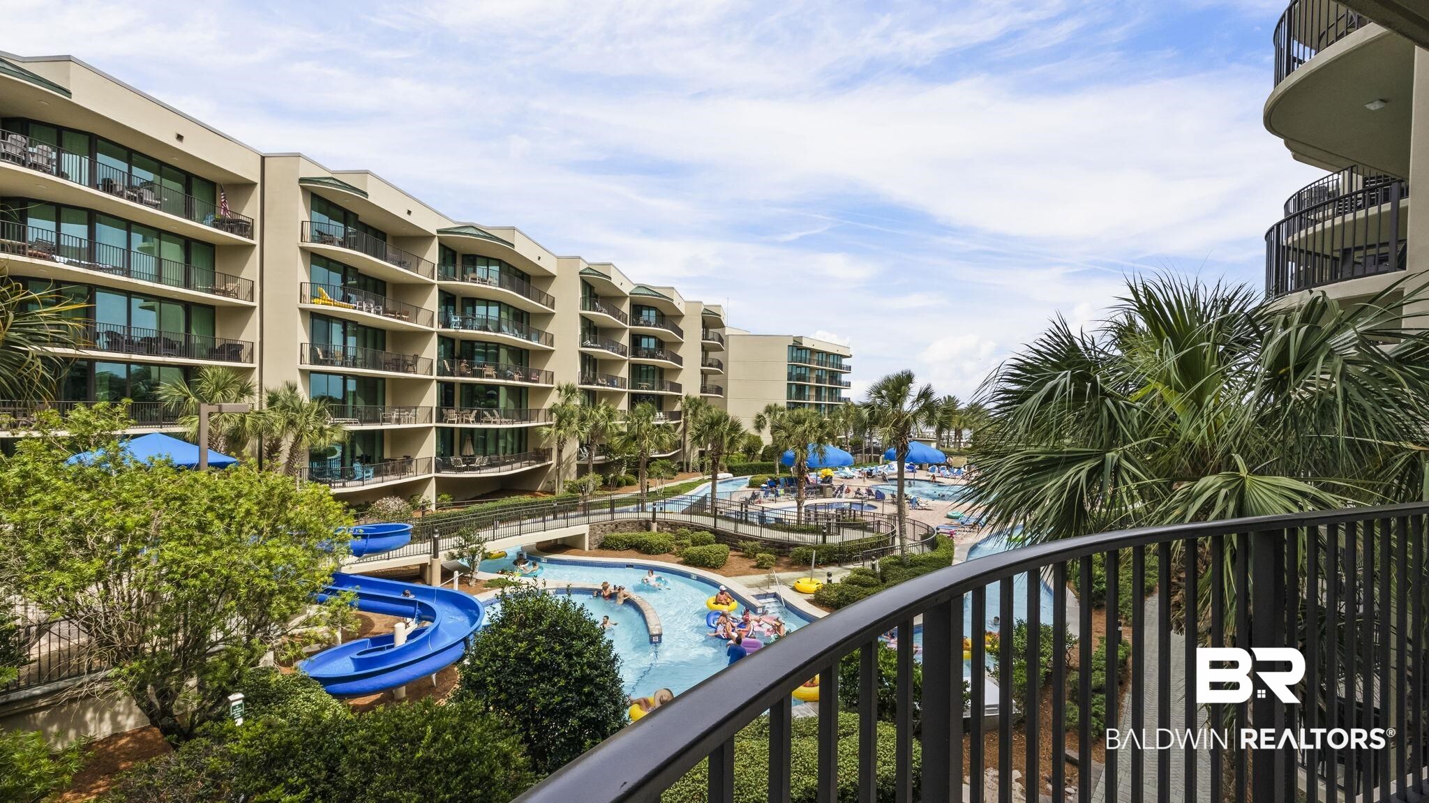 27580 Canal Road, Unit 1213 Orange Beach, AL 36561 - Photo 21 of 27 Multi-level resort complex featuring a water park with a lazy river and slide