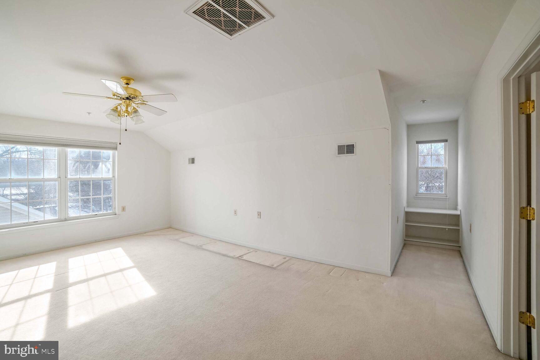 7312 Summerwind Circle Laurel, MD 20707 - Photo 17 of 24 a view of an empty room with a window