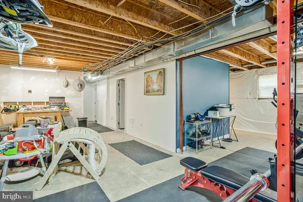 a storage room with furniture and a table