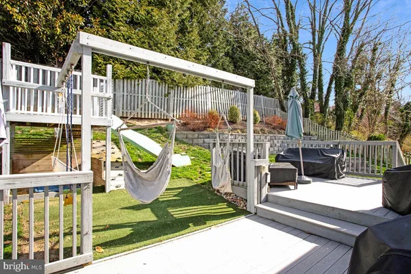 a view of a chairs and table in the patio
