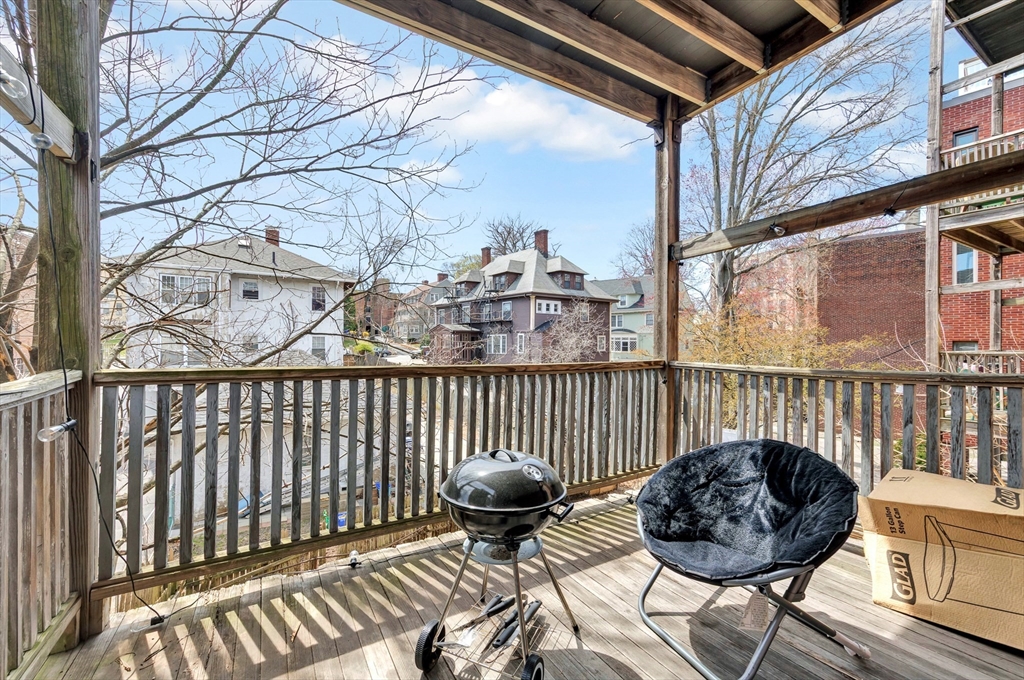 104 Strathmore Road Boston, MA 02135 - Photo 30 of 41 a view of a balcony with furniture
